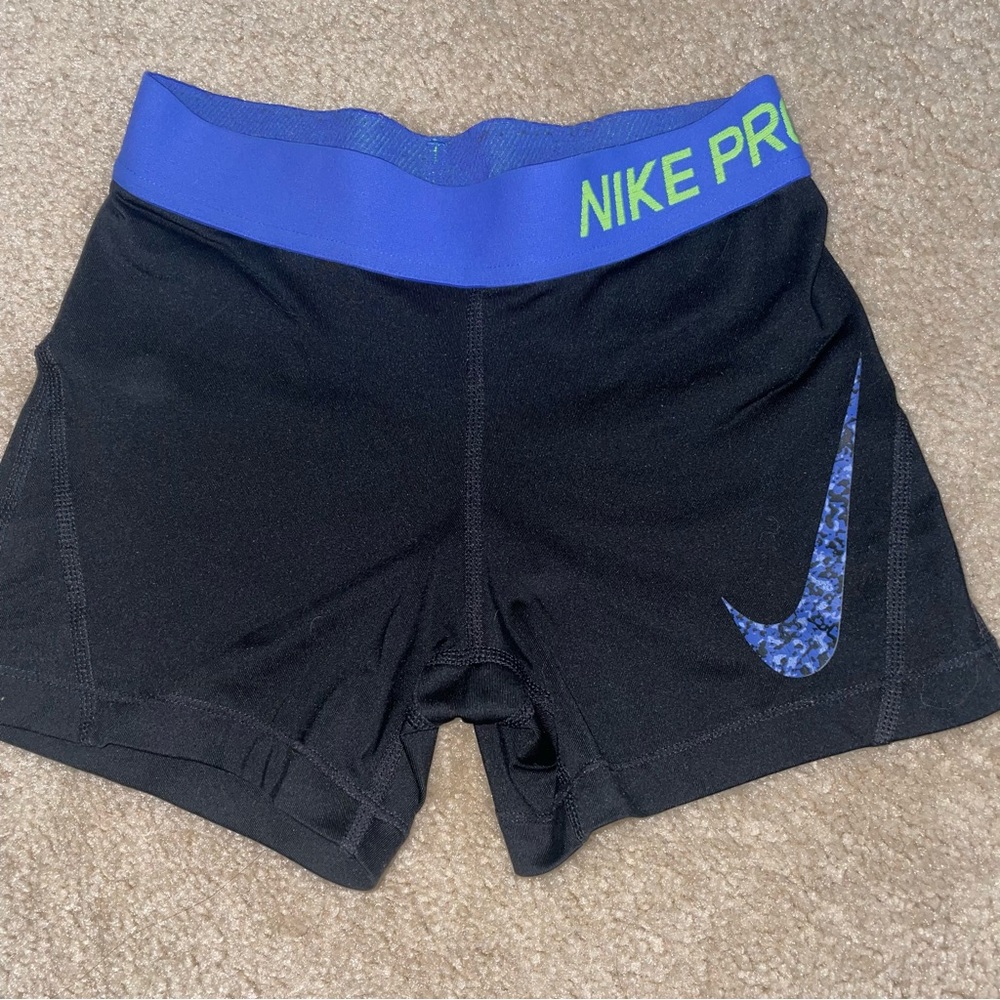 black and blue nike pros, old version, kids S